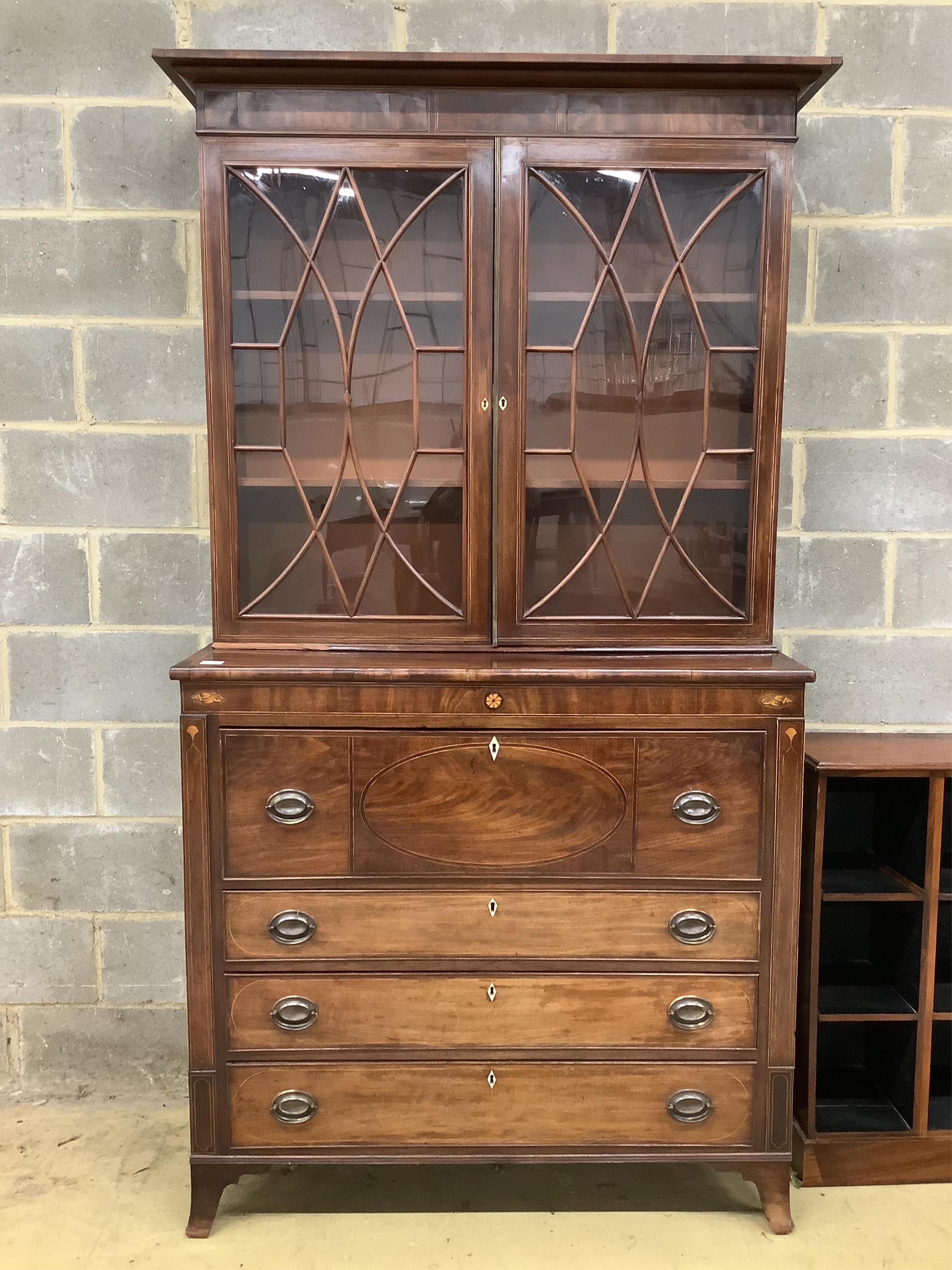 A George III mahogany secretaire bookcase, width 120cm, depth 53cm, height 224cm. Condition - fair